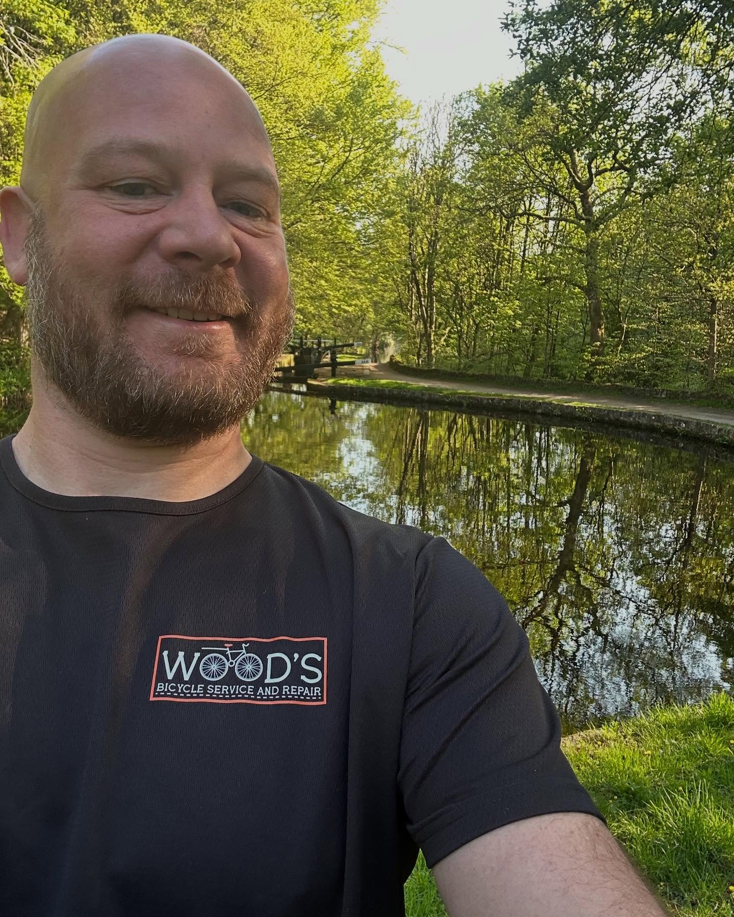 Matt in a Wood's shirt beside the canal